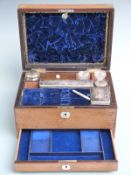 19th century mahogany cased travelling set, the fitted velvet interior with silver plate mounted