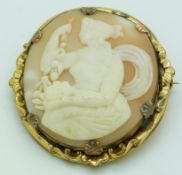 Victorian pinchbeck brooch set with a cameo, 4 x 4.5cm
