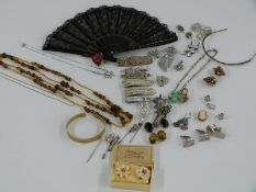 A quantity of vintage paste/ diamanté jewellery, cameo, fan, Art Deco flower necklace, silver