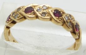 A 9ct gold ring set with garnets and diamonds, 2.2g, size O/P