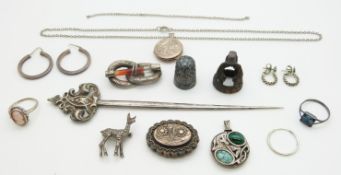 Two Victorian silver brooches, silver locket, silver thimble, white metal letter opener etc