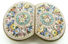 A 19thC Italian micro mosaic buckle, with floral decoration, maker's mark FAP, width 70cm