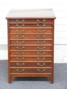 Mahogany collector's chest of ten drawers each set with ornate drop handles, 58 x 54 x 87cm