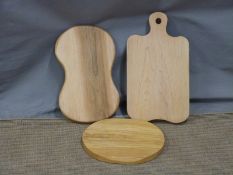 Three handmade wooden chopping boards