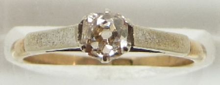 A yellow metal ring set with an old cut diamond measuring approximately 0.4ct, 2.0g, size N