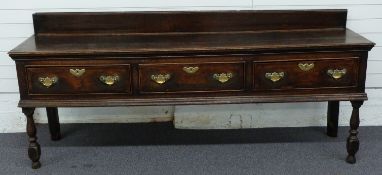 George II oak low dresser, with three frieze drawers, each drawer cross banded with walnut, oak