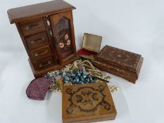 A collection of costume jewellery including brooches, Miracle brooch, cameo, white metal necklace,