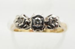 An 18ct gold ring set with three diamonds in a platinum setting, 2.8g, size I/J