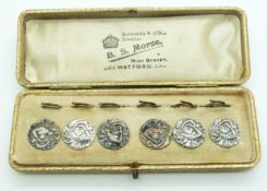 A boxed set of Edwardian silver buttons depicting a lady playing a harp, Birmingham 1903, maker