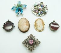 A silver brooch, two cameo brooches and a Victorian silver swivel fob,  a Victorian swivel fob set