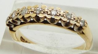 A 9ct gold half eternity ring set with diamonds, 3.2g, size P