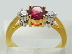 COLLECTING  An 18ct gold ring set with a round cut natural ruby of approximately 0.7ct, origin Sri