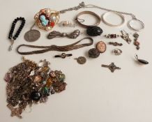 A collection of silver jewellery including earrings, pendants, Victorian brooches, brooches, cameo