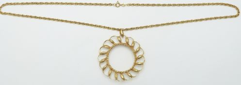 A 9ct gold chain and coin mount, 21g