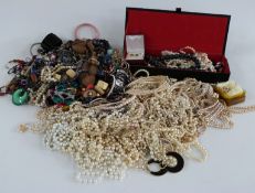 A collection of costume jewellery including faux pearls, necklaces, bracelets etc