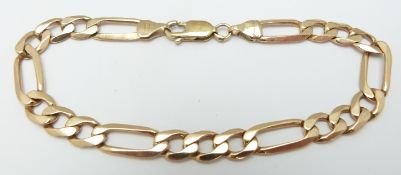 A 9ct gold flat curb link bracelet, 10.9g