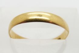 A 22ct gold wedding band/ ring, London 1887, size N, 1.5g.