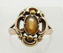 A 9ct gold ring set with an oval citrine, 2.8g, size L