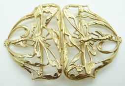 A silver gilt buckle in an Art Nouveau style depicting dragonflies
