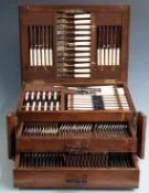 Oak cased twelve place setting canteen of cutlery by Poston & Co. Ltd, width 49.5cm