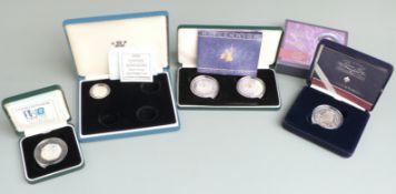 Royal Mint silver proof cased coins comprising Queen Mother Centenary crown, a pair of Millennium