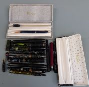 A collection of various fountain pens etc.