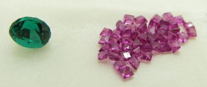 Thirty five loose square cut rubies and green stone (garnet topped doublet)