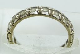 A 9ct white gold eternity ring, size K, 2.3g.