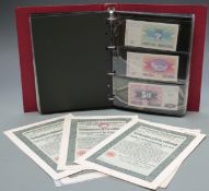 Approximately 100 uncirculated overseas banknotes and late 19th and early 20thC cheques etc and a