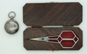 A pair of Art Deco scissors in bespoke rosewood box and silver plated sovereign case.
