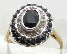 A 9ct gold ring set with sapphires and diamonds, 4.3g, size N