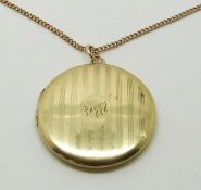 A 15ct gold locket (10g) and 9ct gold chain (4.1g)