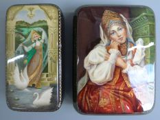 Two Russian lacquer boxes depicting ladies in traditional Russian dress, signed (approximately 9cm x