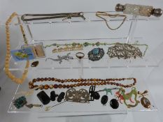 A collection of Victorian jewellery and items including chatelaine, Art Nouveau brooches, yellow