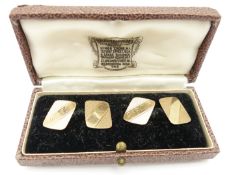 A pair of 9ct gold cufflinks with engine turned decoration in Bravingtons box, 5.4g