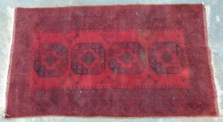 Turkoman kilim with 4 guls on wine red ground, 114 x 205cm