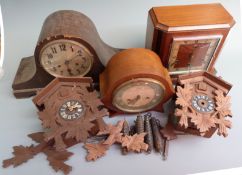 A group of clocks for the restorer to include two German cuckoo clocks and three circa 1930's mantel