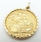 A 1901 gold full sovereign in 9ct gold mount, 8.85g