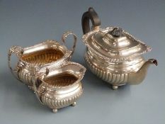 Edward VII hallmarked silver three piece teaset with fluted lower bodies, London 1908 maker Edward