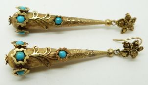 A pair of early Victorian earrings of textured tear drop form with applied floral decoration, set
