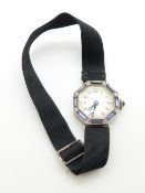 A 9ct white gold Art Deco ladies watch, the octagonal face set with baguette cut Montana sapphires