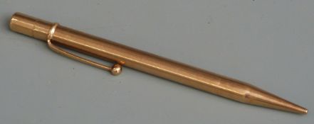 A 9ct gold pencil marked JM&Co, London 1947, 12cm long