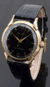 Bulova gold plated gentleman's automatic wristwatch with gold hands and Arabic numerals, black
