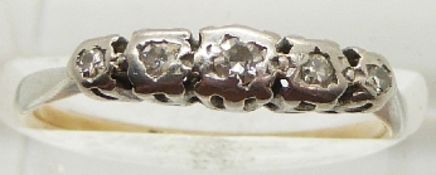 An 18ct gold ring set with diamonds in a platinum setting, 2.4g, size N