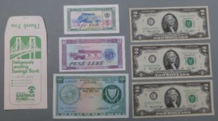 Three two dollar USA banknotes, 1976 bi-centenary, together with two Albanian lek notes and a Cyprus