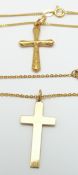 A 9ct gold cross and chain (3.3g) and an 18ct gold cross and chain (5.2g)