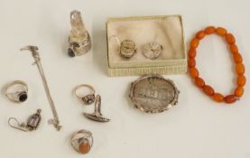 Victorian 'Martha' brooch, four silver rings, silver chain and a Baltic amber bracelet