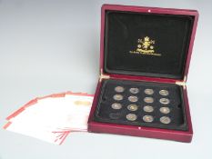 The Worlds Finest Gold Miniatures coin collection comprising fifteen 22ct and 24ct gold coins in