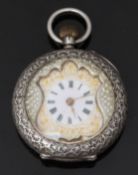 Continental silver keyless winding open faced pocket watch with shield shaped dial surround, multi-