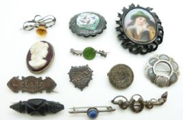 Victorian silver brooch depicting horseshoes and crop, Victorian Mizpah brooch, two other